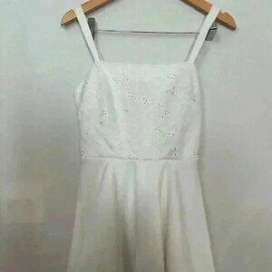 Trixxi Juniors' Women's White Sleeveless Eyelet Cutout Fit & Flare dress.